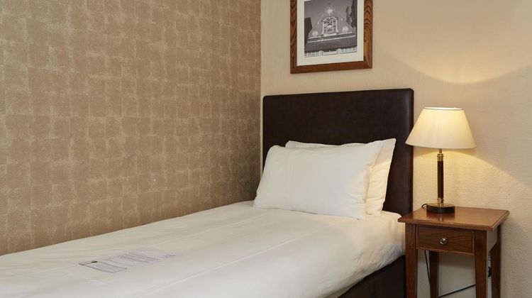 The Rising Sun Hotel Room