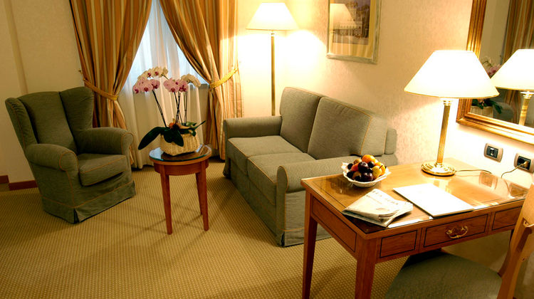 Excelsior Hotel Room