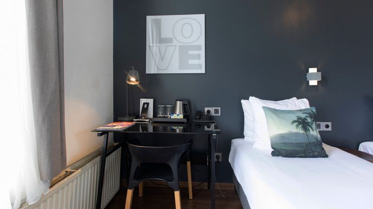The Quentin Hotel Room