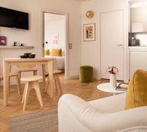 Nell Hotel & Suites Room