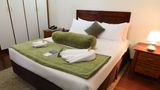 Huon Gulf Hotel & Apartments Room