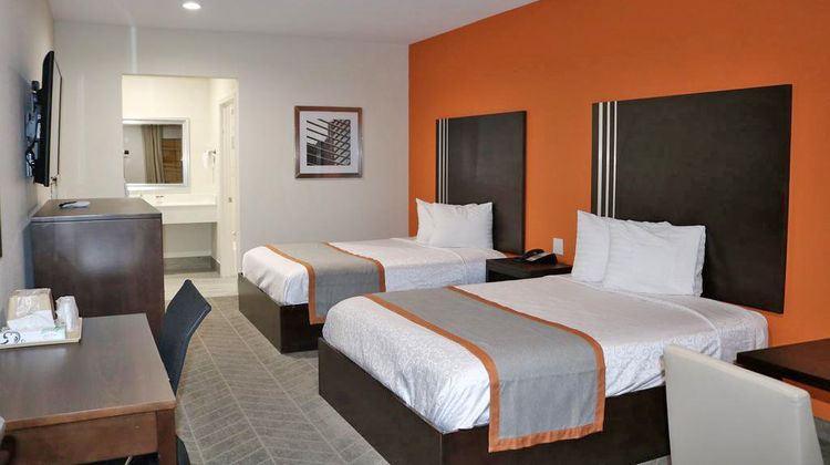 Scottish Inns & Suites Room