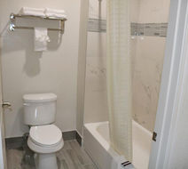 Scottish Inns & Suites Room