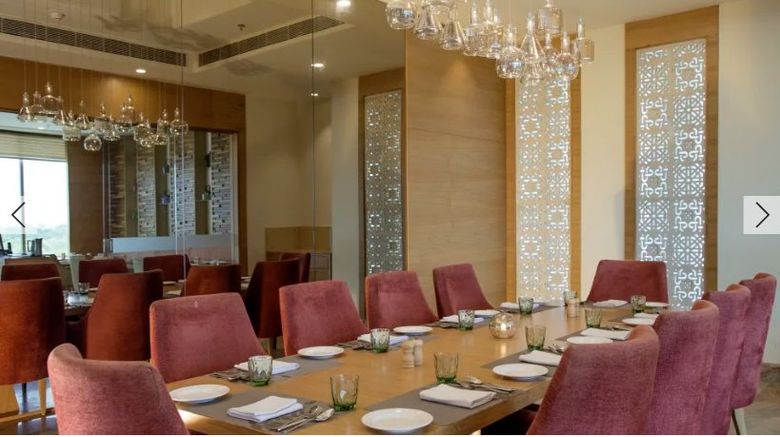 <b>Efcee Sarovar Premiere Bhavnagar Restaurant</b>. Images powered by <a href="https://www.leonardoworldwide.com/" title="Leonardo Worldwide" target="_blank">Leonardo</a>.