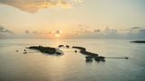 <b>COMO Cocoa Island Exterior</b>. Images powered by <a href=https://www.travelagewest.com/Hotels/Male-Maldives/