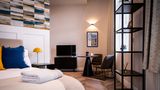 The Gresham Aparthotel Room