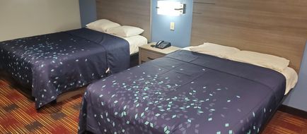 Scottish Inns & Suites Room
