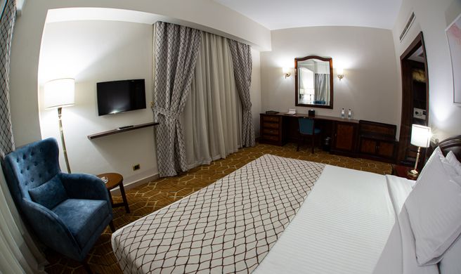 Triumph Plaza Hotel Room