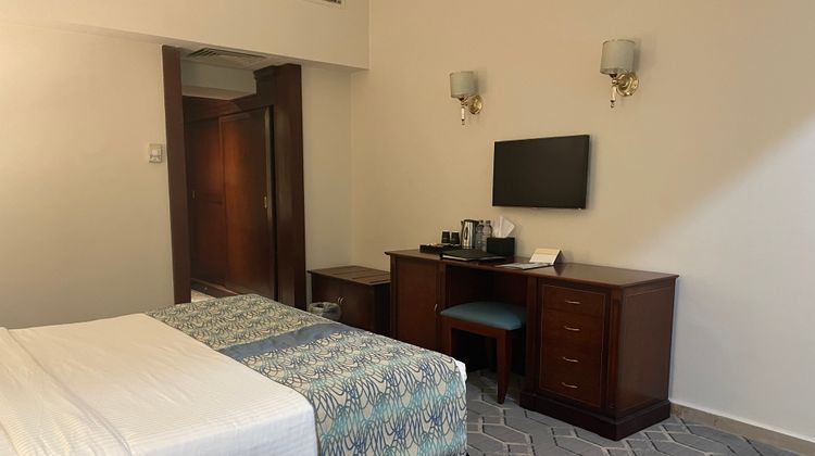 Triumph Plaza Hotel Room