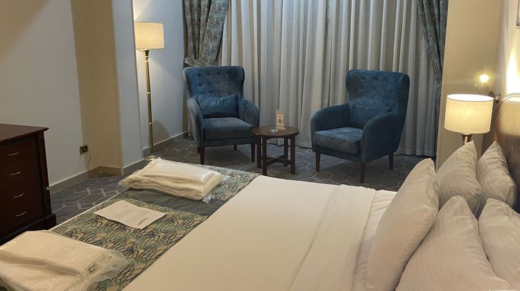 Triumph Plaza Hotel Room