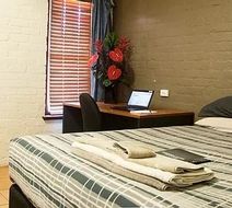 Newman Hotel Room