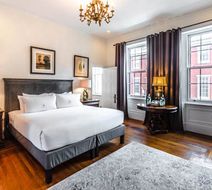 The DWIGHT D Hotel Room