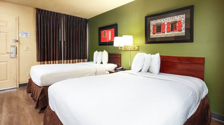 Home 1 Suites Extended Stay Room