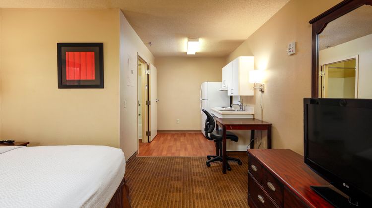 Home 1 Suites Extended Stay Room