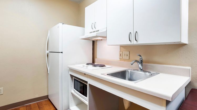Home 1 Suites Extended Stay Room
