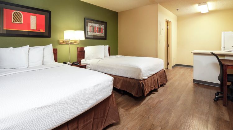 Home 1 Suites Extended Stay Room