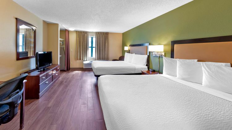 Home 1 Suites Extended Stay Room