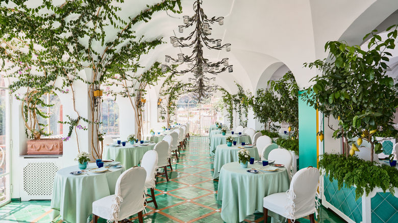 <b>Le Sirenuse Hotel Restaurant</b>. Images powered by <a href=https://www.travelagewest.com/Hotels/Positano-Italy/