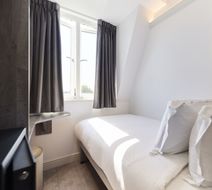 The Edwin Hotel Room