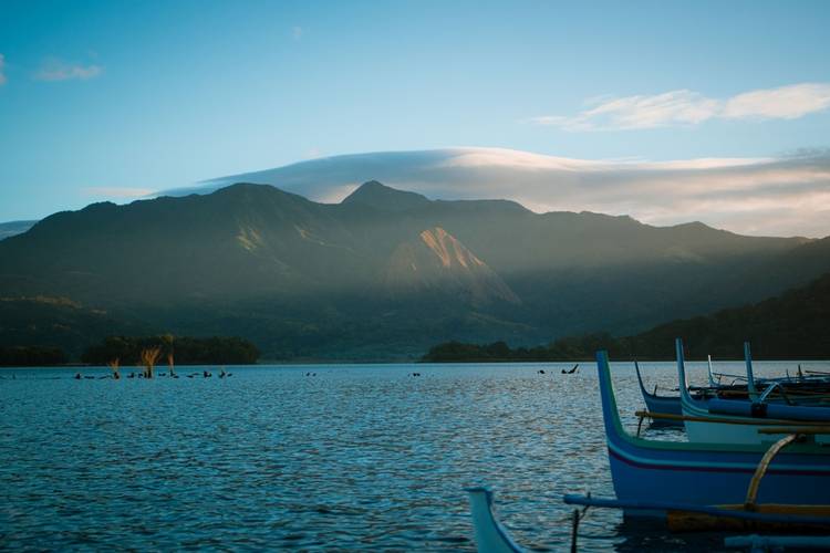 people couple lovers camping at lake mapanuepe at morning and sunset with landscape view of mountains