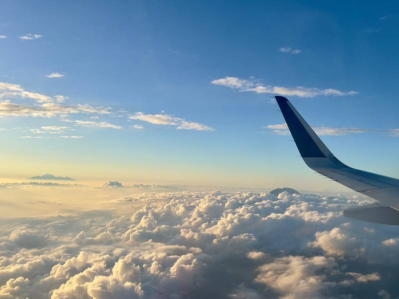 The appearance of Mount Agung in Bali and Mount Rinjani in Lombok as seen from the plane in the morning