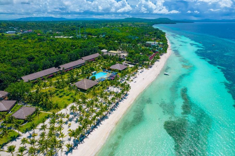 Aerial view of Bohol Beach Club at Dumaluan Beach in the island of Panglao, Philippines.