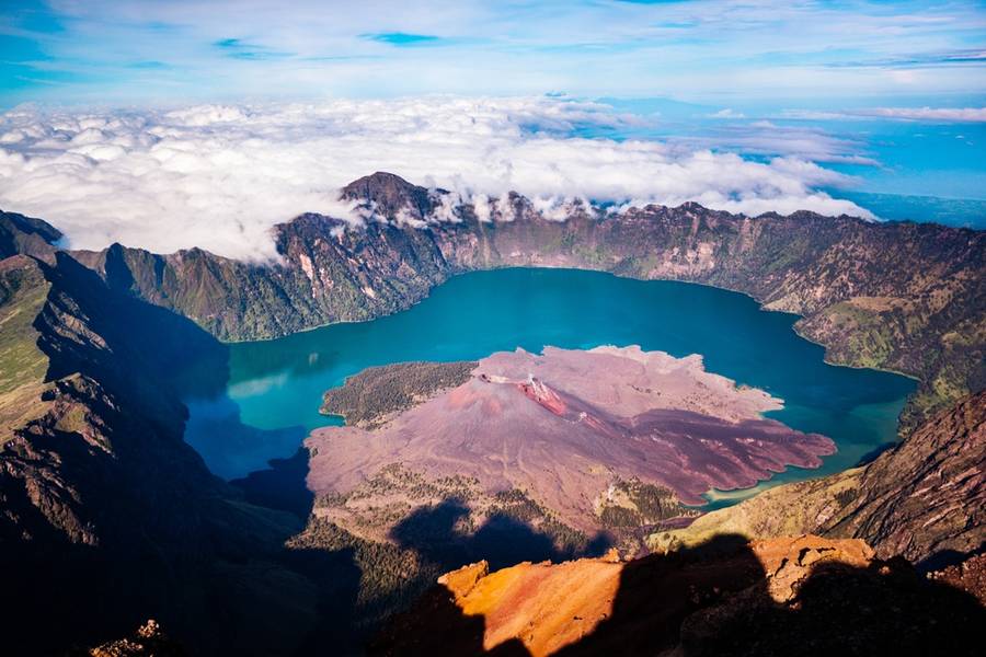 Beautiful view of Lake Segara Anak from the top of Mount Rinjani which is located in Lombok, West Nusa Tenggara, Indonesia.