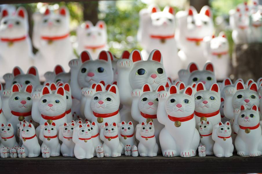 1,000 of lucky cats are sitting at Gotokuji temple, Tokyo, Japan.