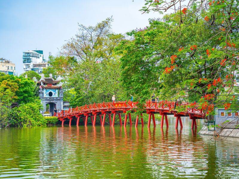 Ngoc Son Temple and the famous Huc Bridge leading the path way to it. @Shutterstock