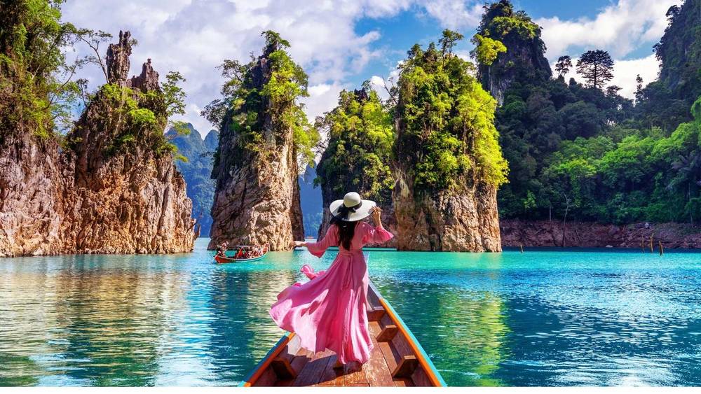 A woman on a boat in Khao Sok National Park inThailand