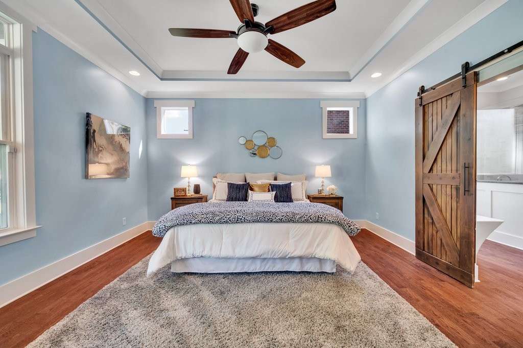 12 of 32. Bedroom with Barn Door