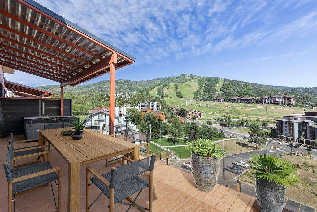 1 of 6. Trex deck, a partially covered deck over the saltwater hot tub, outdoor gas grill. Unbeatable views of the ski mountain and South Valley! Furniture is virtually staged