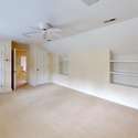 Second floor guest suite/3rd bedroom with private bathroom, walk-in closets and kitchenette.