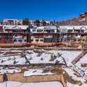 Walkway along the lower level and staircase to the right leads you down to Ski Time Square and access to the slopes