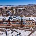 Snowy aerial view with a mountain view