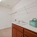 Laundry Room with Utility Sink and Storage