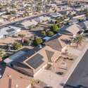 A breathtaking aerial view of Sun City West, highlighting its pristine homes, desert landscaping, and thoughtfully designed community layout. Ideal for those seeking tranquility in Arizona's serene desert environment.