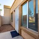 This private, enclosed patio provides a welcoming entryway and added outdoor space. Perfect for a pet-friendly home or a personal garden, this space enhances the home s security and curb appeal while offering a peaceful retreat in the heart of Phoenix.