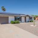 This beautifully upgraded Sun City home features solar panels for energy savings, fresh exterior paint, and a well-maintained desert landscape. Enjoy a modern, move-in-ready home in a vibrant 55+ community.