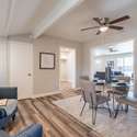 A beautifully remodeled Arizona room with high ceilings, recessed lighting, and a bright, airy feel. Use it as a dining area, sunroom, or relaxation space.