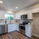 Enjoy a fully updated kitchen with soft-close cabinets, quartz countertops, and energy-efficient stainless steel appliances. A perfect mix of functionality and style.
