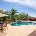 Host unforgettable gatherings with a built-in BBQ, shaded dining, and resurfaced pool. Surrounded by colorful plants and privacy landscaping, this backyard offers an upscale escape just minutes from Scottsdale s best amenities.