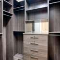 Enjoy two thoughtfully designed walk-in closets with custom cabinetry and modern finishes. Plenty of room for his-and-hers storage in this luxurious Scottsdale master suite.