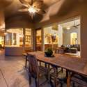 This sheltered patio blends indoor elegance with outdoor serenity. Overlooking the main living areas, it's the perfect spot for connecting with guests while enjoying Arizona s beautiful climate.
