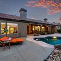 Take in the soft Arizona sunset from this spacious poolside lounge, complete with built-in landscaping and updated hardscaping. The sparkling pool reflects the warmth of golden hour while the expansive patio invites relaxation and alfresco entertaining.