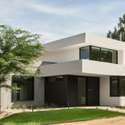 Flooded with natural light, the home s sculptural facade offers maximum impact. The thoughtful mix of stucco, concrete, and landscape elements captures the spirit of luxury desert living.