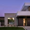 Twilight sets the stage for this showpiece home s striking silhouette. The crisp geometry and warm interior light evoke a private, modern sanctuary in one of Phoenix s most desirable pockets.