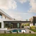 This sleek backyard retreat features a sparkling pool, covered patio, and clean lines that echo the home s interior elegance perfect for entertaining or peaceful Arizona mornings.