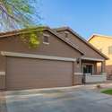 A wide concrete driveway and two-car garage provide convenience and extra storage. This energy-conscious home is perfect for buyers looking for low maintenance and ease of access in Laveen.