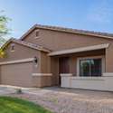 Relax on the covered front patio, ideal for sipping coffee or catching up with neighbors. This added outdoor space enhances everyday living and brings a touch of community charm.